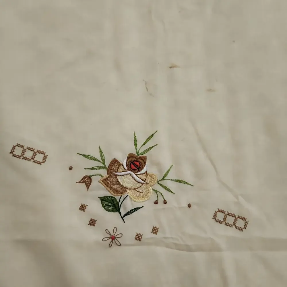 Unbranded embroidered oval
